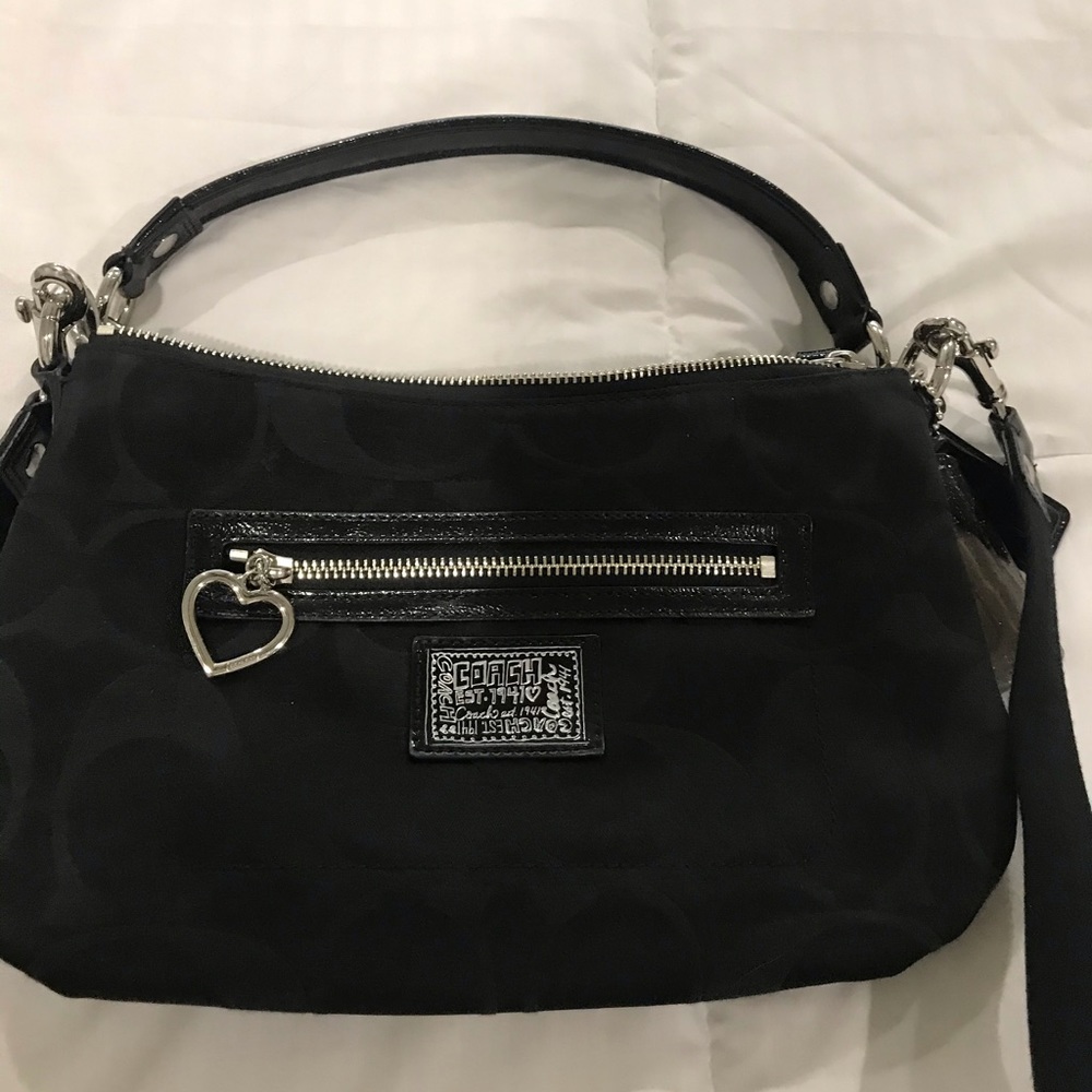 NWOT SIGNATURE COLLECTION COACH HANDBAG.